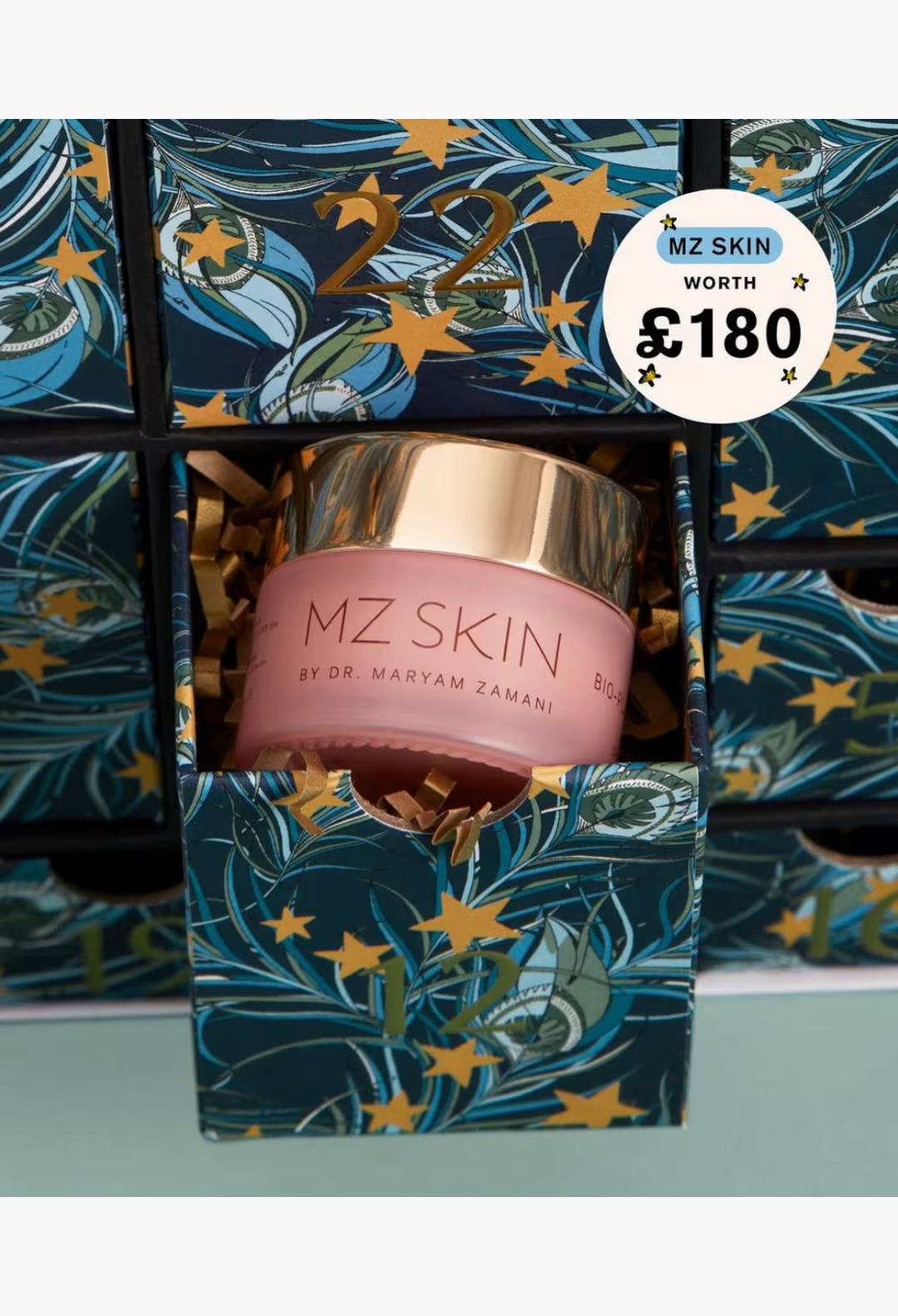 GLAM MODA Beauty Advent Calendar 2026 featuring a pink MZ Skin jar inside a patterned drawer with gold star accents