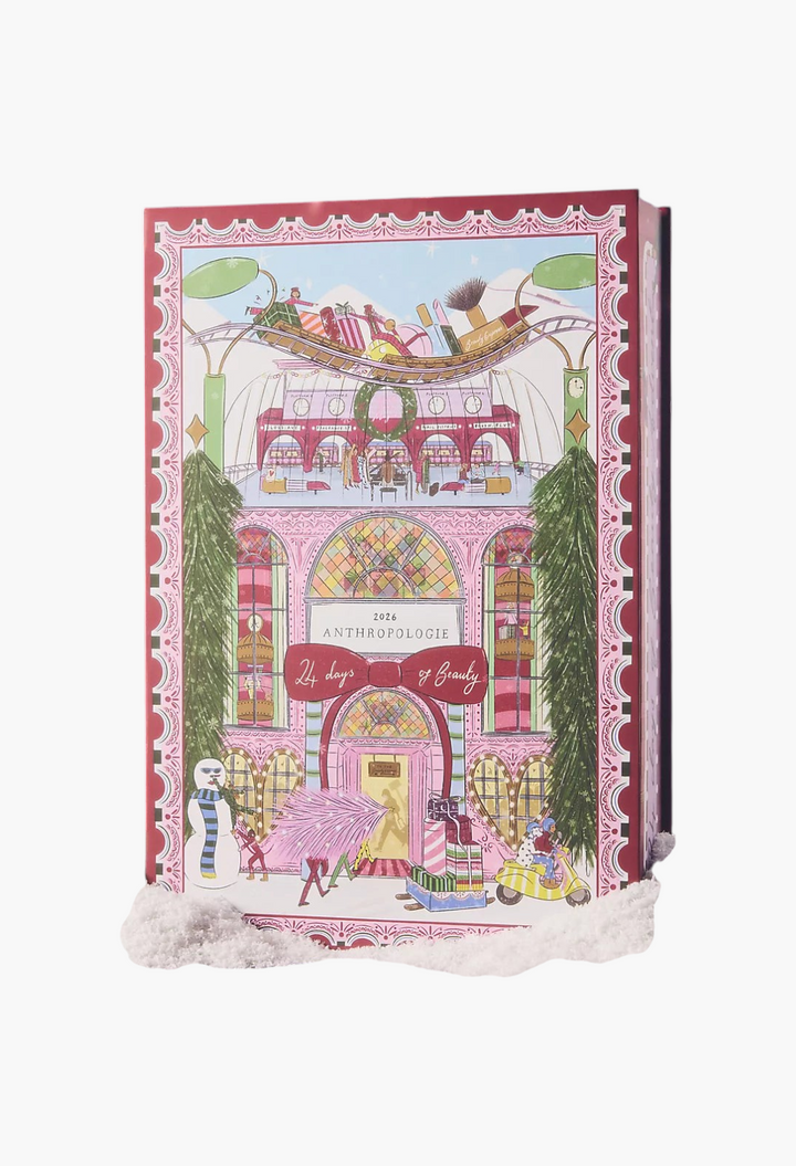 GLAM MODA 2026 beauty advent calendar featuring whimsical pink holiday illustration by Nephthys Foster in snow.