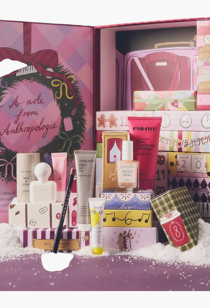 GLAM MODA 24-day beauty advent calendar featuring skincare, fragrance, and makeup samples in a whimsical gift box.