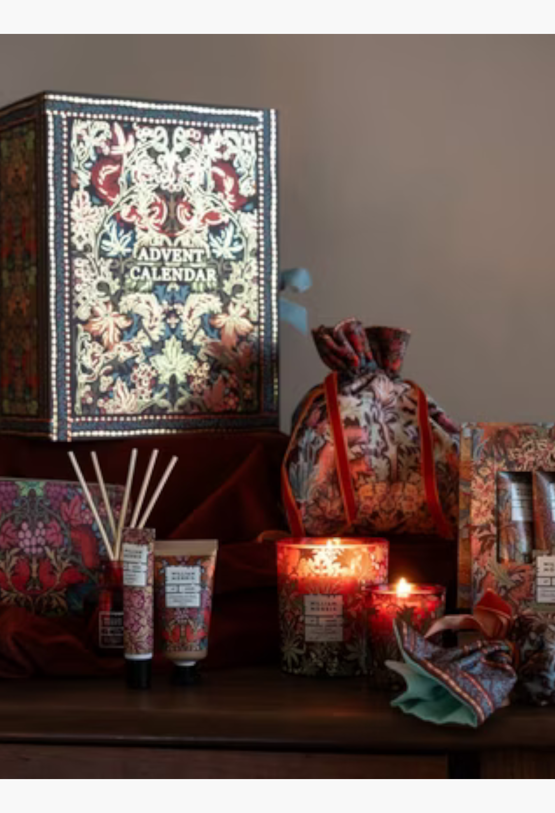GLAM MODA William Morris At Home 2026 beauty advent calendar with botanical Oak and Willow print and assorted gifts.