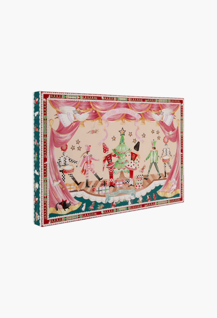 GLAM MODA Nutcracker Theatre advent calendar featuring festive stage illustrations with pink curtains and characters.