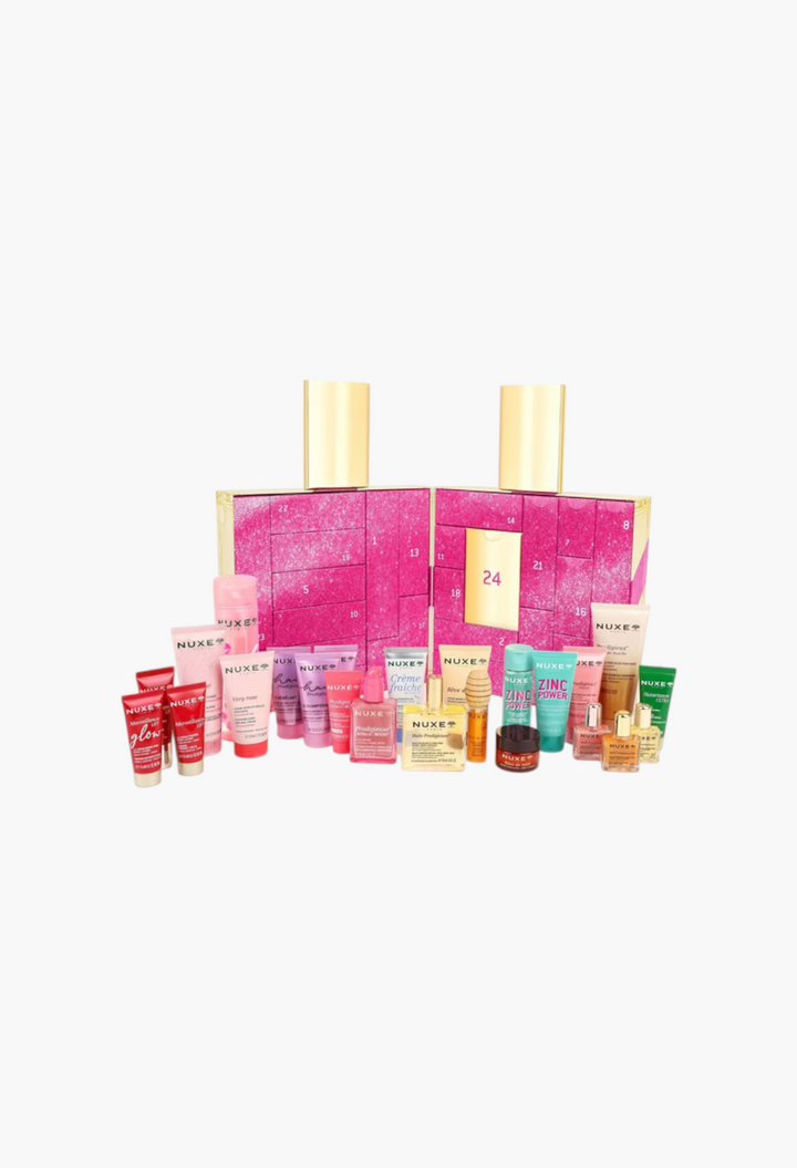 GLAM MODA Nuxe Advent Calendar featuring 24 skincare and beauty products in a pink and gold gift box set.