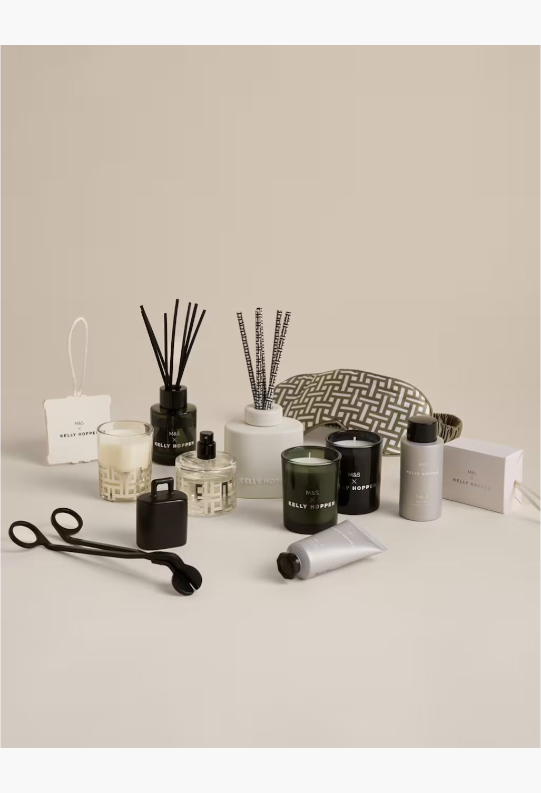 GLAM MODA 12 Days of Wellness Advent Calendar featuring scented candles, reed diffusers, and a sleep mask.