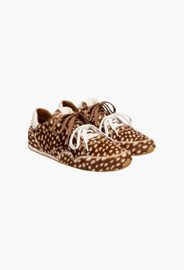 GLAM MODA Women's Bond Sport Sneakers in brown and white animal print calf hair with lace-up closure and rubber sole.