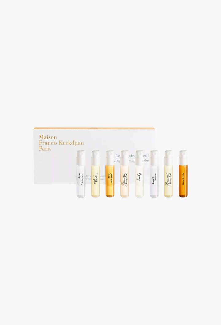 GLAM MODA Maison Francis Kurkdjian fragrance gift set featuring eight travel-sized perfume vials in a white box.