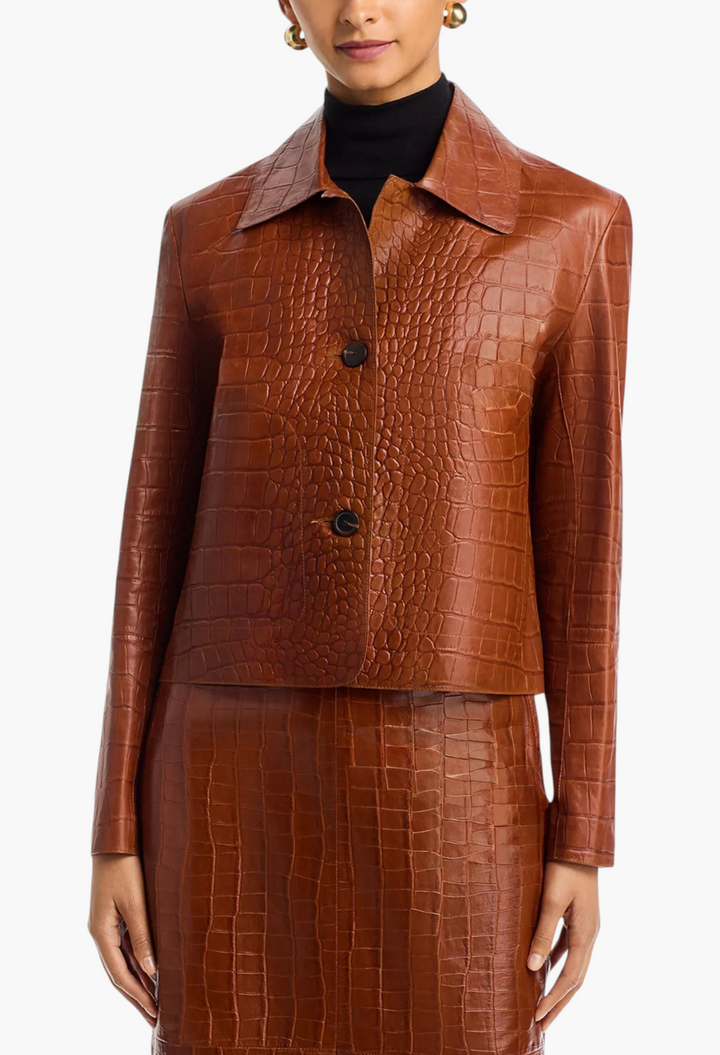 GLAM MODA Emy brown embossed leather jacket with a spread collar and button front closure on a model