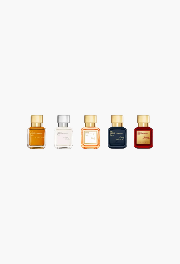 GLAM MODA Maison Francis Kurkdjian fragrance miniatures gift set featuring five iconic perfume bottles in a row