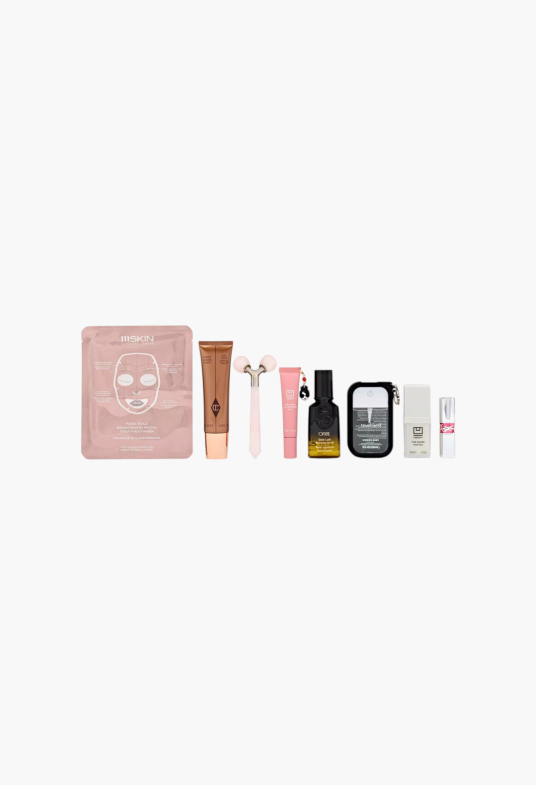 GLAM MODA Alice + Olivia 7-day beauty advent calendar set featuring skincare, makeup, hair care, and accessories.
