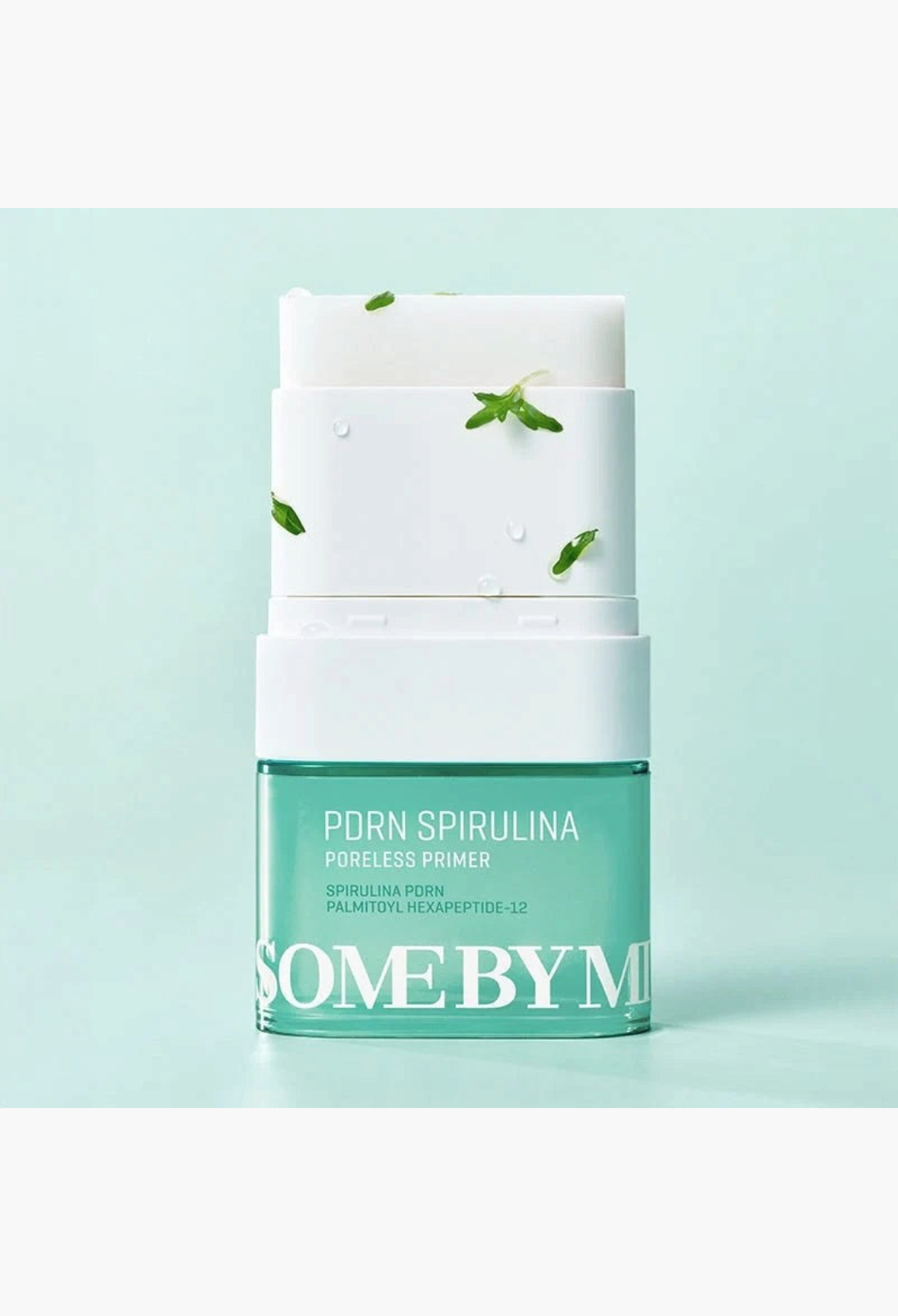 GLAM MODA SOME BY MI PDRN Spirulina Poreless Primer stick in a teal and white container on a light green background.