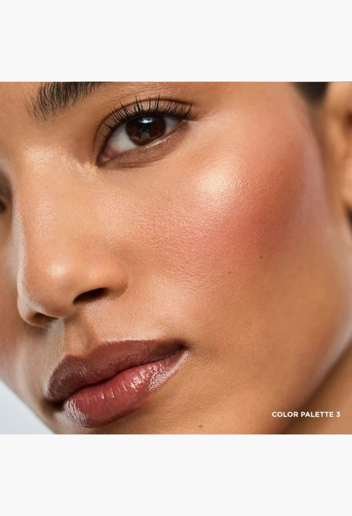 Close-up of a model wearing GLAM MODA Ambient Lighting Edit Unlocked Color Palette 3 for a radiant, glowing finish.