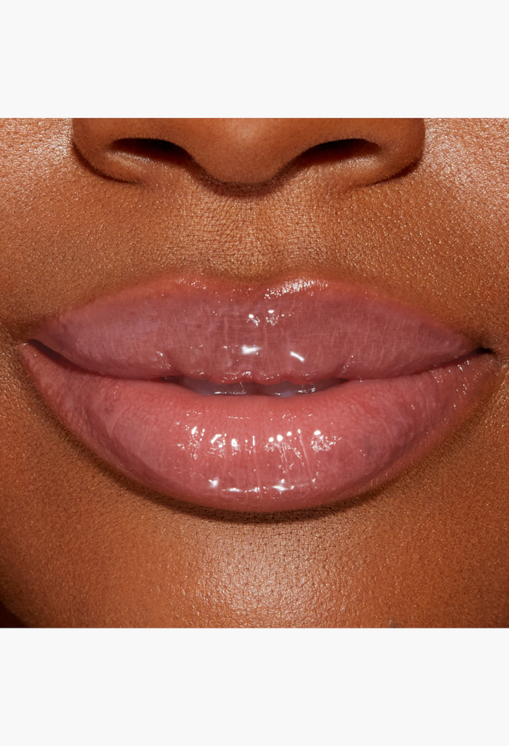 GLAM MODA Lip Injection Power Plumping Lip Gloss in a warm rosy nude shade with a high-shine, volumizing finish.