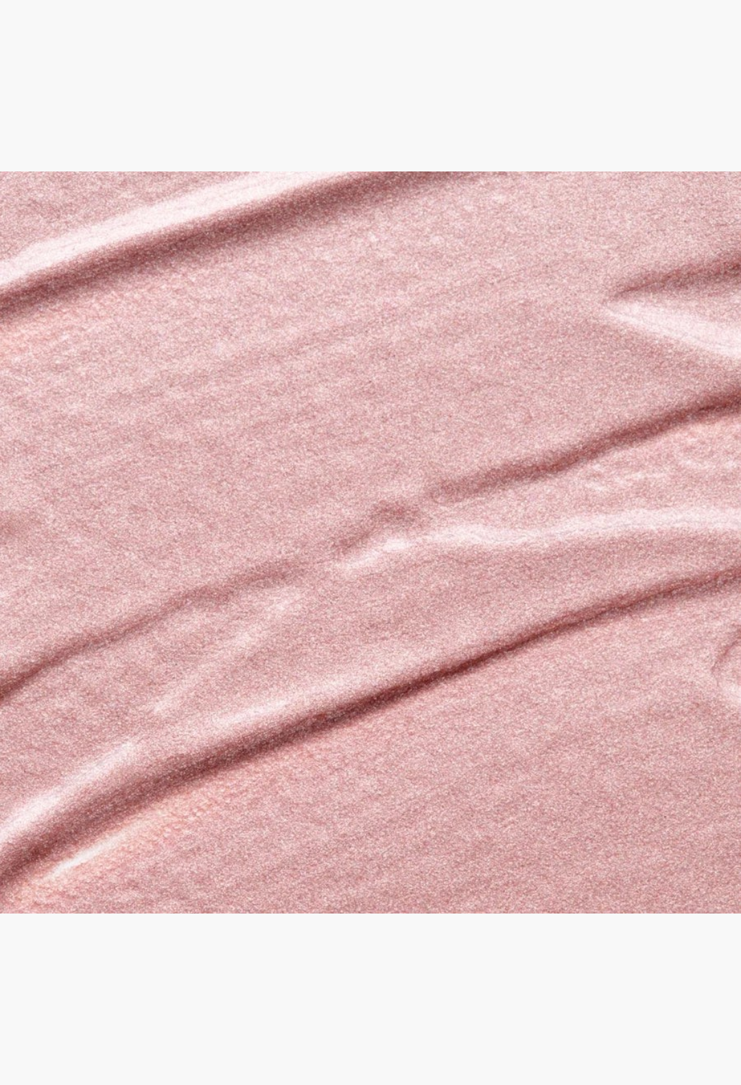 GLAM MODA Hyper Shine Lite Pigment swatch showing a creamy, shimmering rose gold illuminating makeup texture