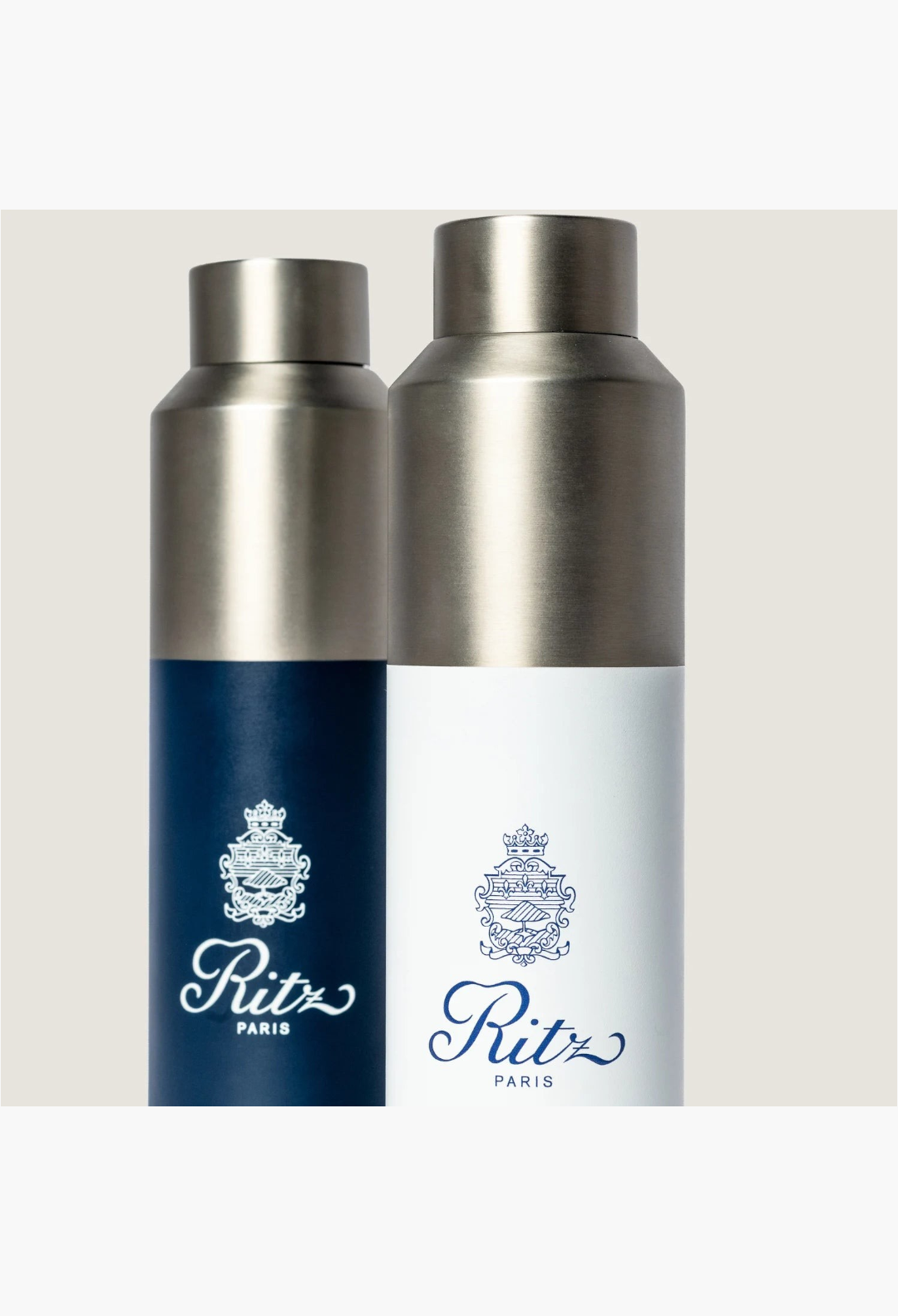 GLAM MODA Ritz Paris insulated recycled steel water bottles in navy and white with metallic caps