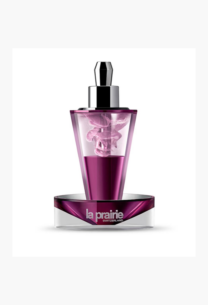 GLAM MODA La Prairie Platinum Rare Haute-Rejuvenation Protocol serum vial in a purple glass bottle with silver base