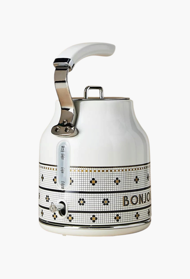 GLAM MODA Bistro Tile electric kettle with white finish, mosaic pattern, and 24k gold accents on a 1.7L stainless body