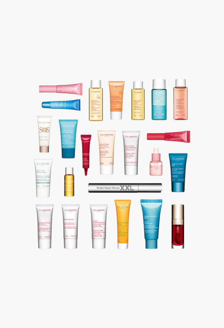 GLAM MODA 24-Day Beauty Advent Calendar featuring a collection of Clarins skincare, makeup, and body care products.
