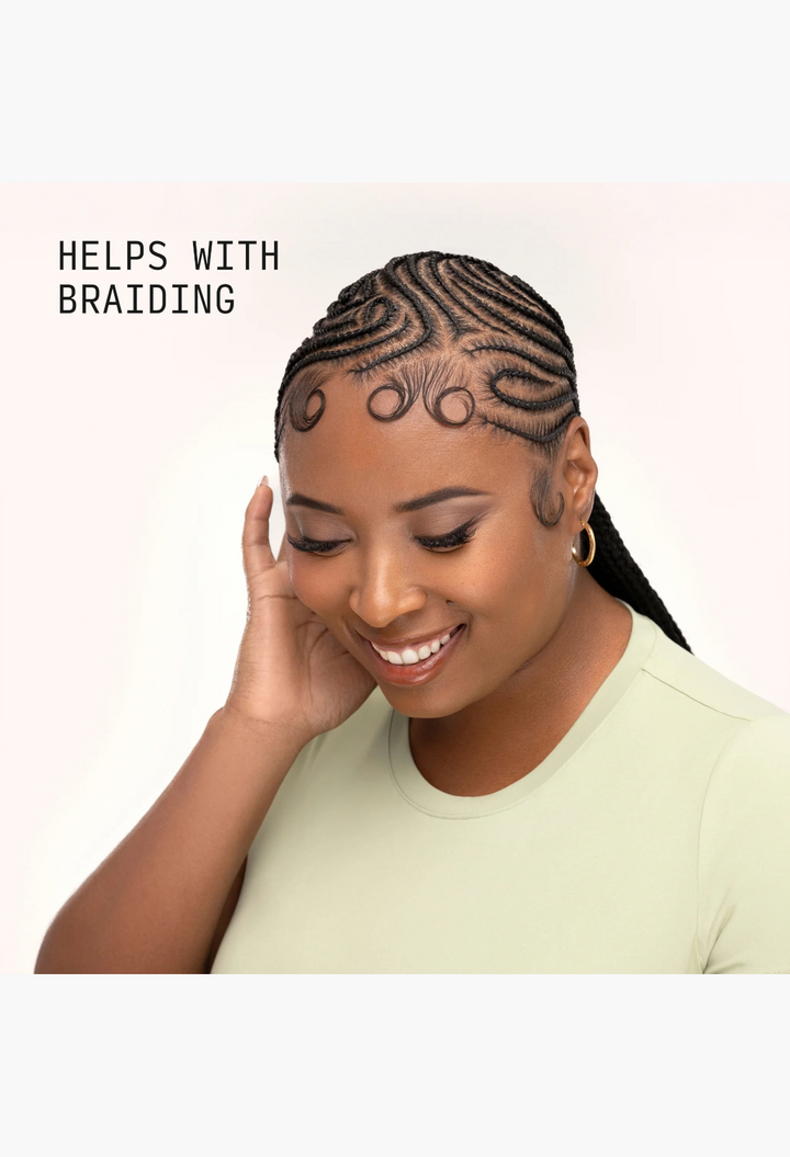 GLAM MODA Braid-Out Bundle used to style intricate cornrow braids with defined baby hairs on a smiling woman