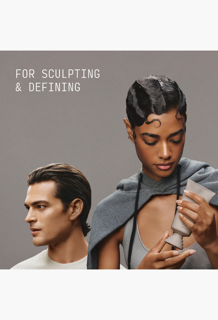 GLAM MODA Strong Hold Gel tube held by a woman with sculpted finger waves, next to a man with a sleek hairstyle.