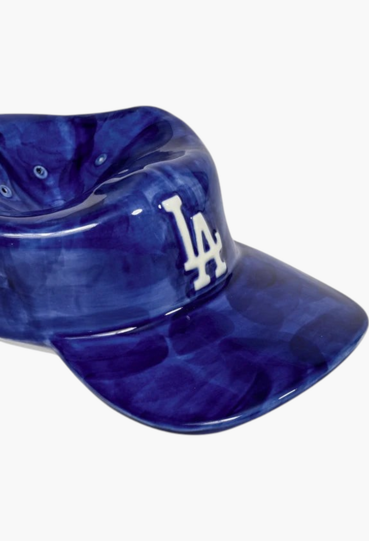 GLAM MODA ceramic incense holder shaped like a blue baseball cap with the iconic LA logo in white.