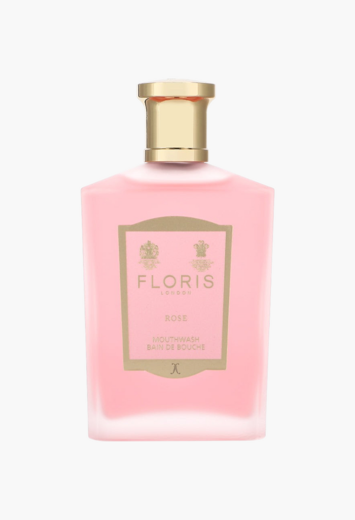 GLAM MODA concentrated rose mouthwash in a frosted pink glass bottle with a gold cap and elegant label