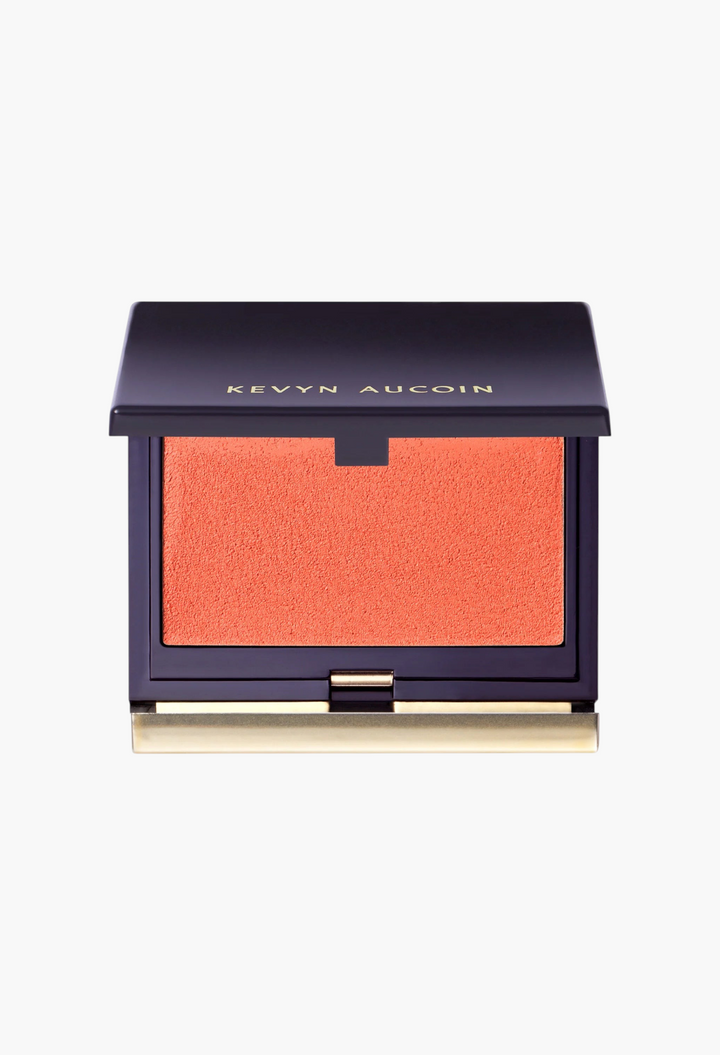 GLAM MODA Kevyn Aucoin The Sensual Skin Blush in Innocence, a vibrant apricot cream-to-powder formula in a compact.