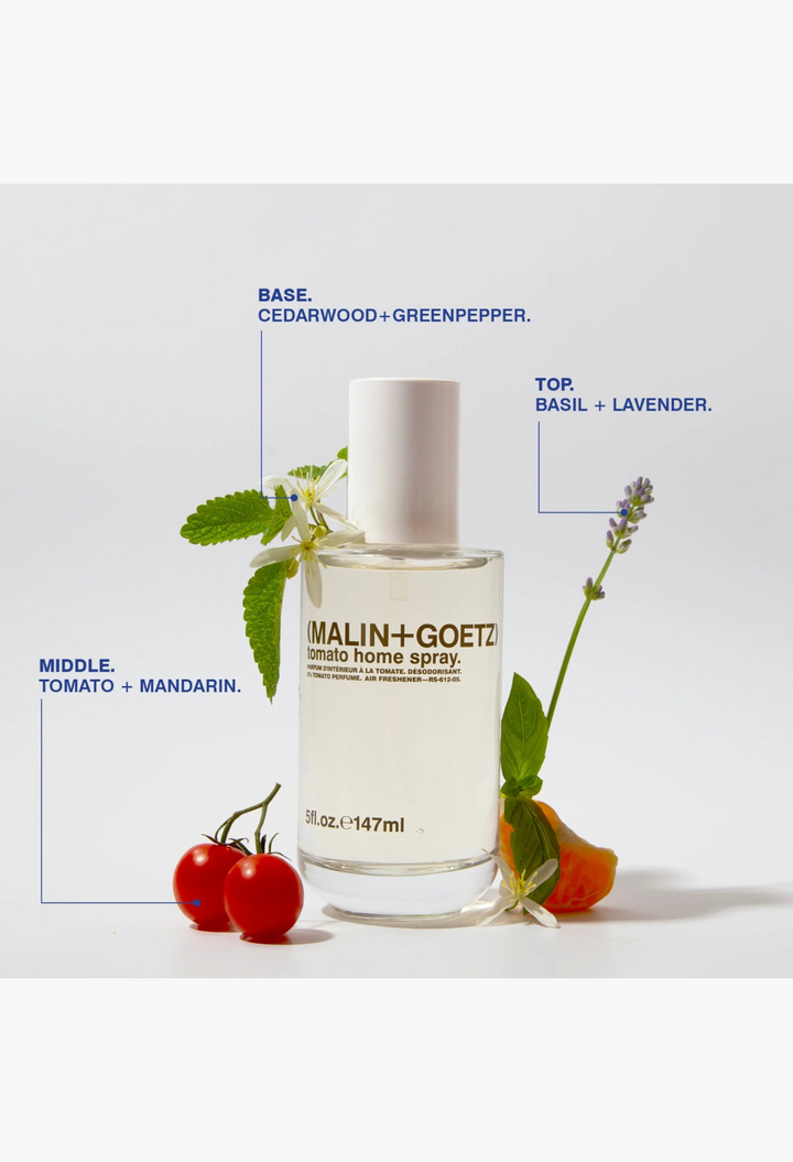 GLAM MODA Malin + Goetz tomato home spray in a clear glass bottle with aromatic herb and citrus scent notes displayed.