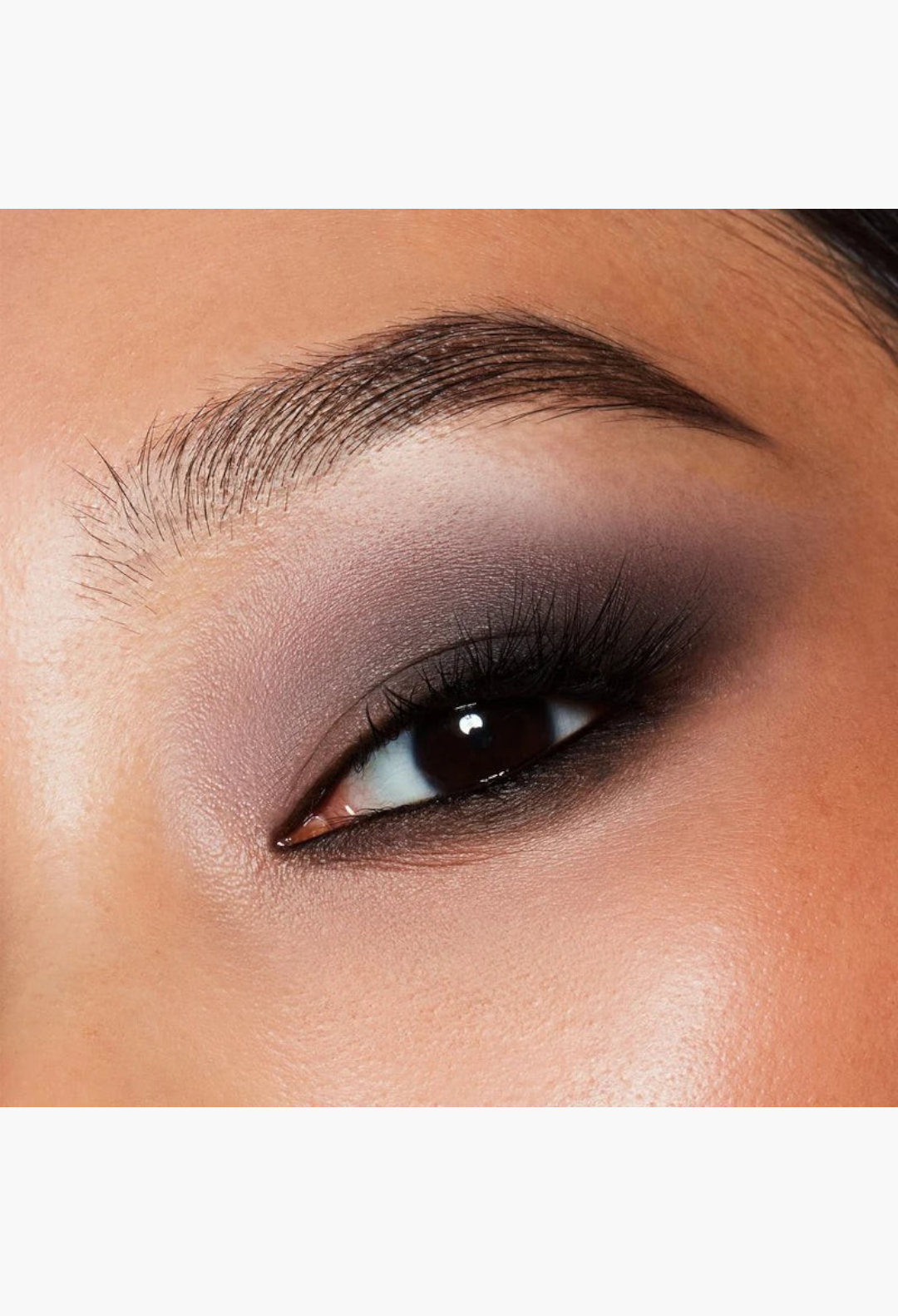 GLAM MODA Major Dimension III matte eyeshadow palette applied as a smoky, blended nude eye look on a model