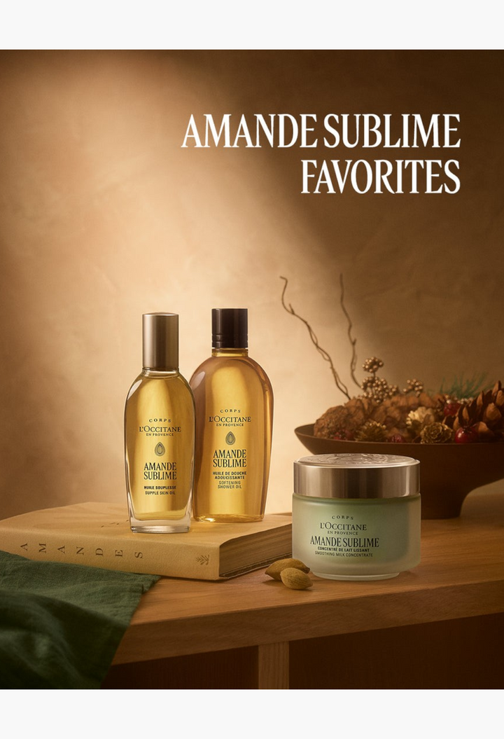 GLAM MODA Prestige Advent Calendar featuring L'Occitane Almond skincare, shower oil, and body cream on a wooden table