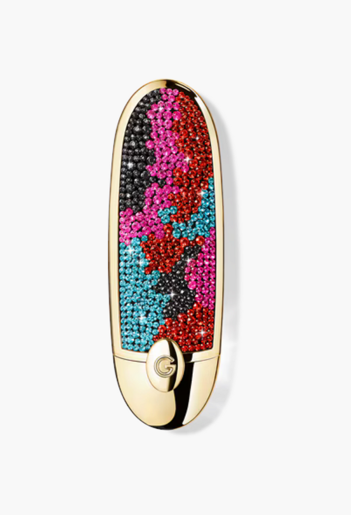 GLAM MODA customizable Rouge G lipstick case featuring a vibrant mosaic of colorful crystals and gold accents.