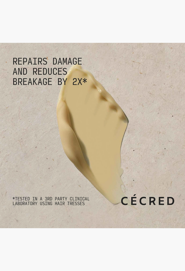 GLAM MODA Cécred Reconstructing Treatment Mask cream texture swatch with text about damage repair and breakage