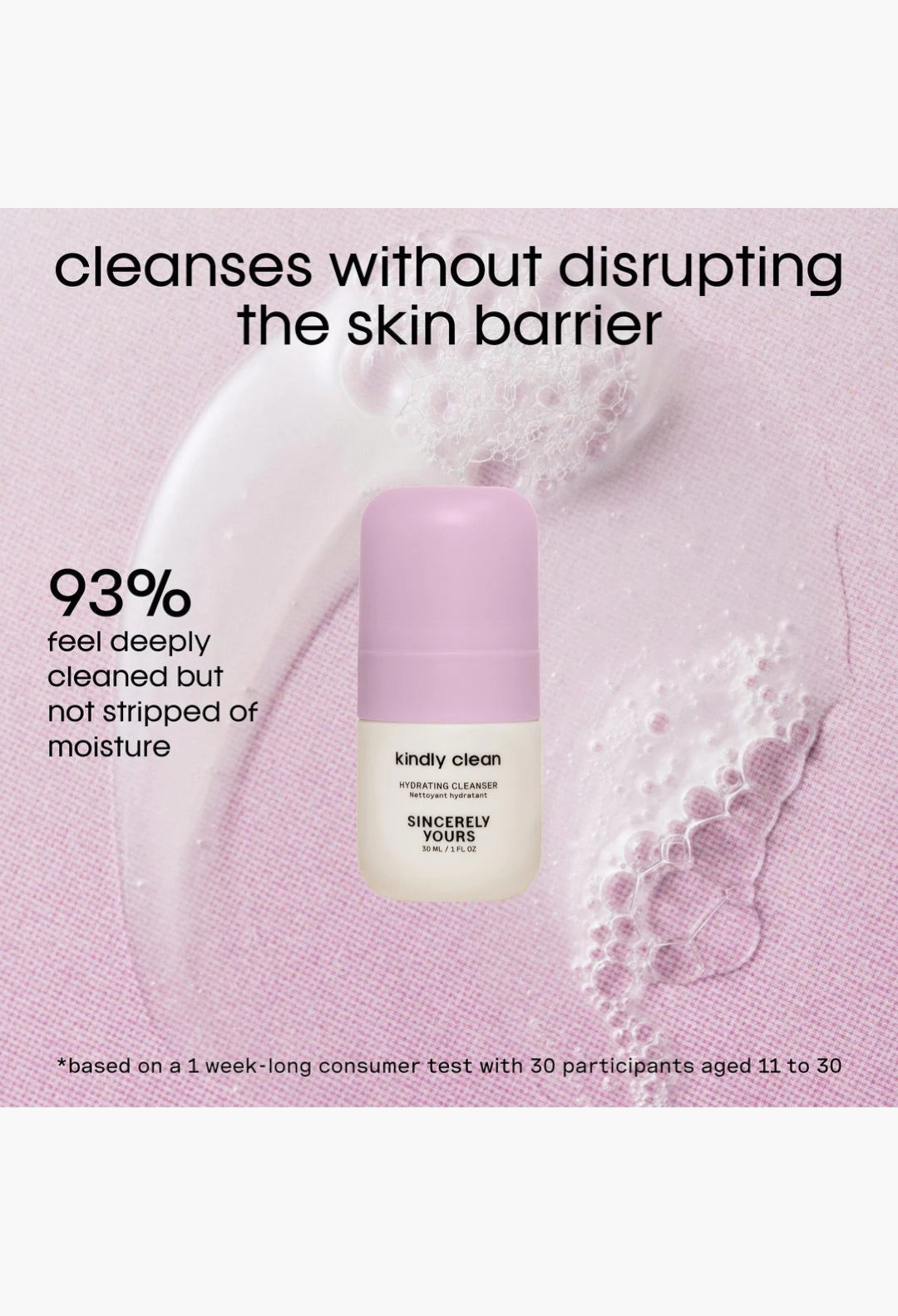 GLAM MODA Kindly Clean hydrating cleanser mini bottle with light purple cap on a textured pink background