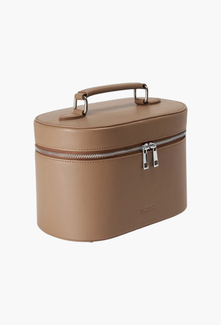 GLAM MODA oval vanity case in espresso brown vegan leather with silver hardware and a top handle.