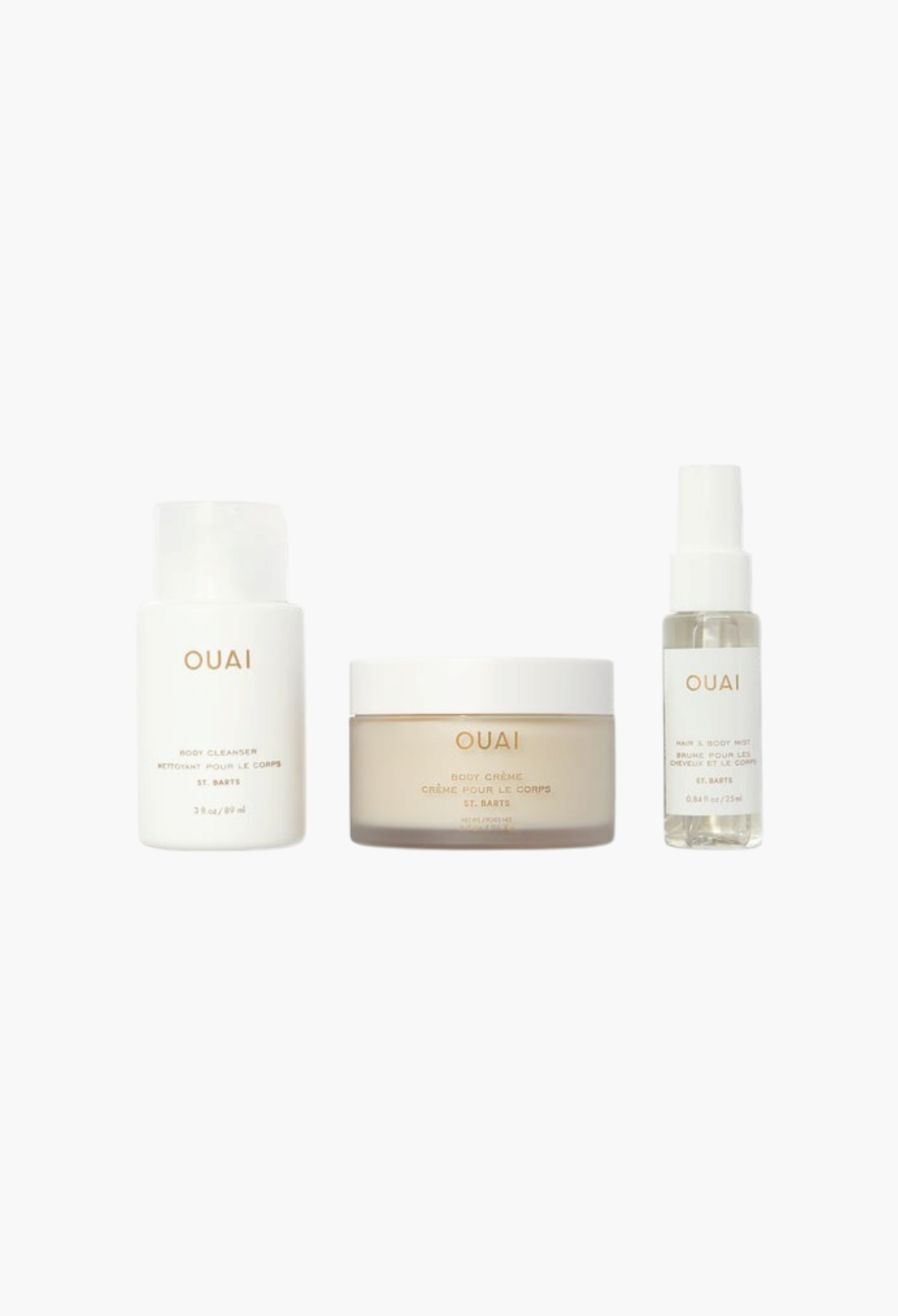 GLAM MODA OUAI St. Barts travel kit featuring body cleanser, body crème, and hair and body mist in travel-sized bottles.