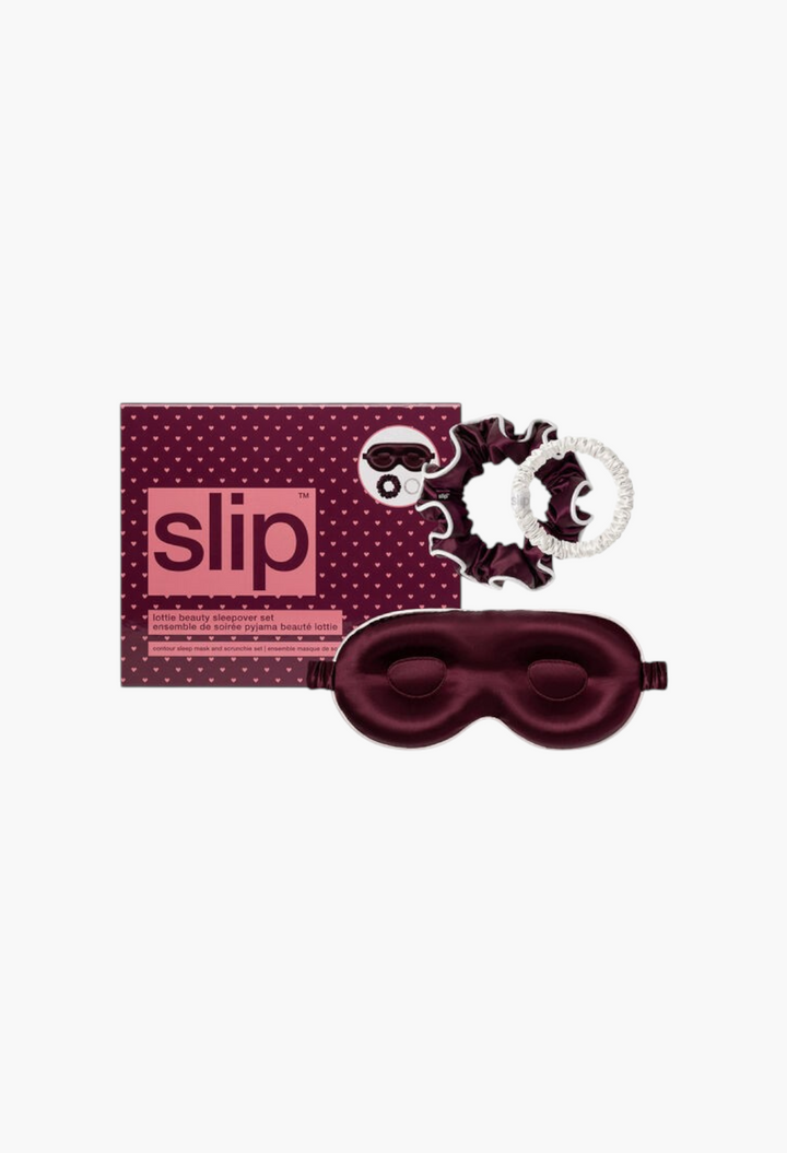 GLAM MODA Slip Pure Silk Beauty Sleepover Set in crimson and white with a contour mask and two silk scrunchies.
