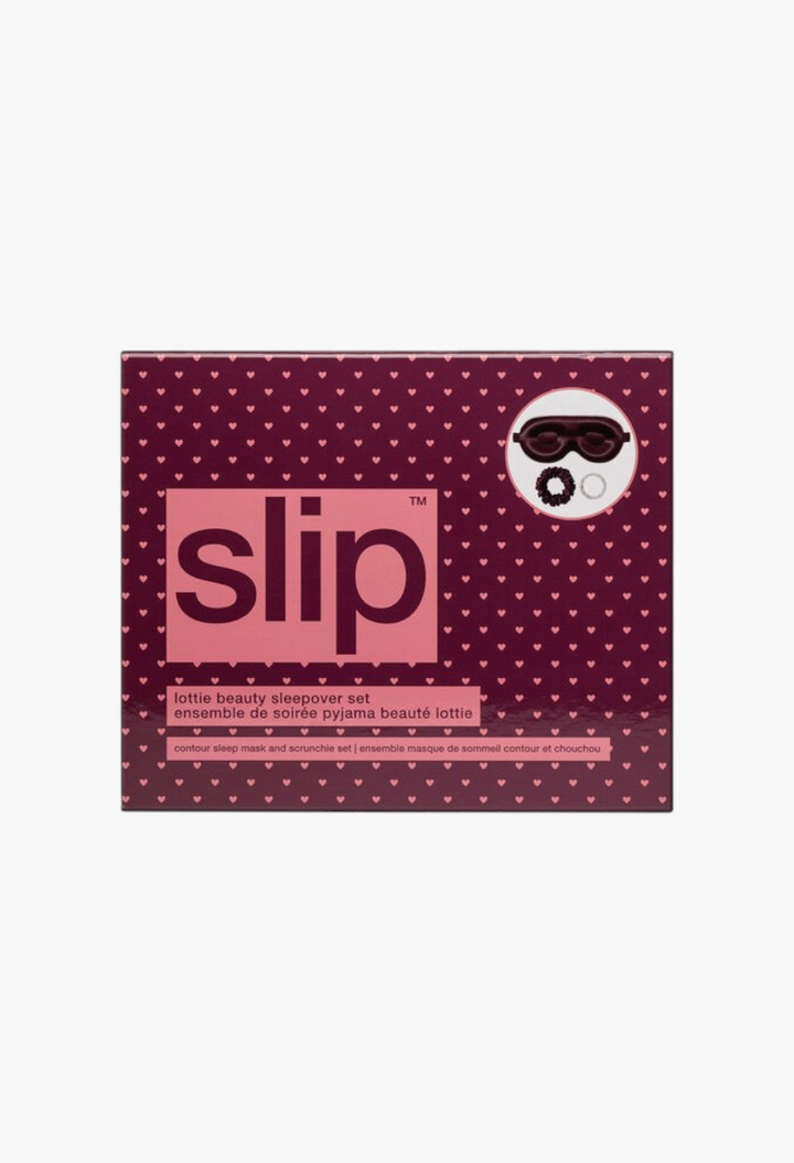 GLAM MODA Slip Lottie beauty sleepover set featuring a crimson silk contour sleep mask and two silk hair scrunchies.