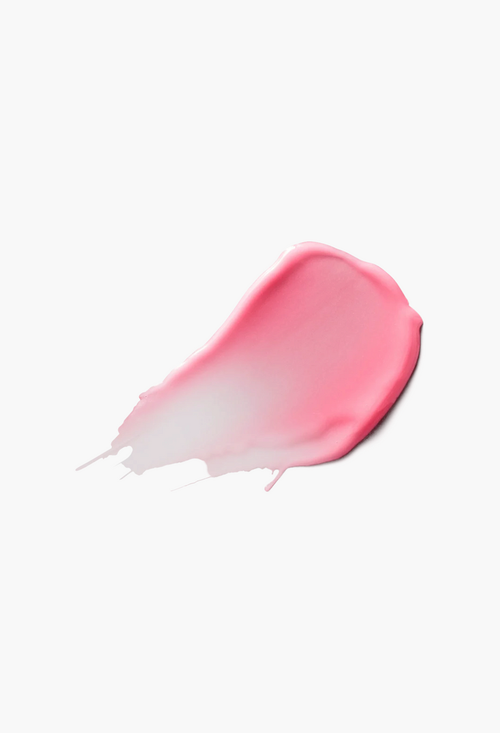 GLAM MODA Posh Balm Nourishing Lip Shine swatch showing a smooth, glossy, sheer pink texture on a white background.