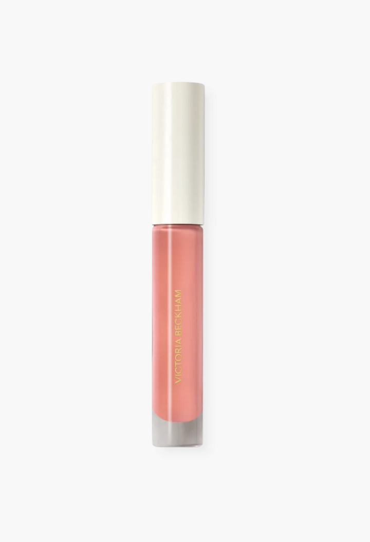 GLAM MODA Posh Gloss High Shine Lip in a soft pink shade with a sleek applicator tube and gold lettering