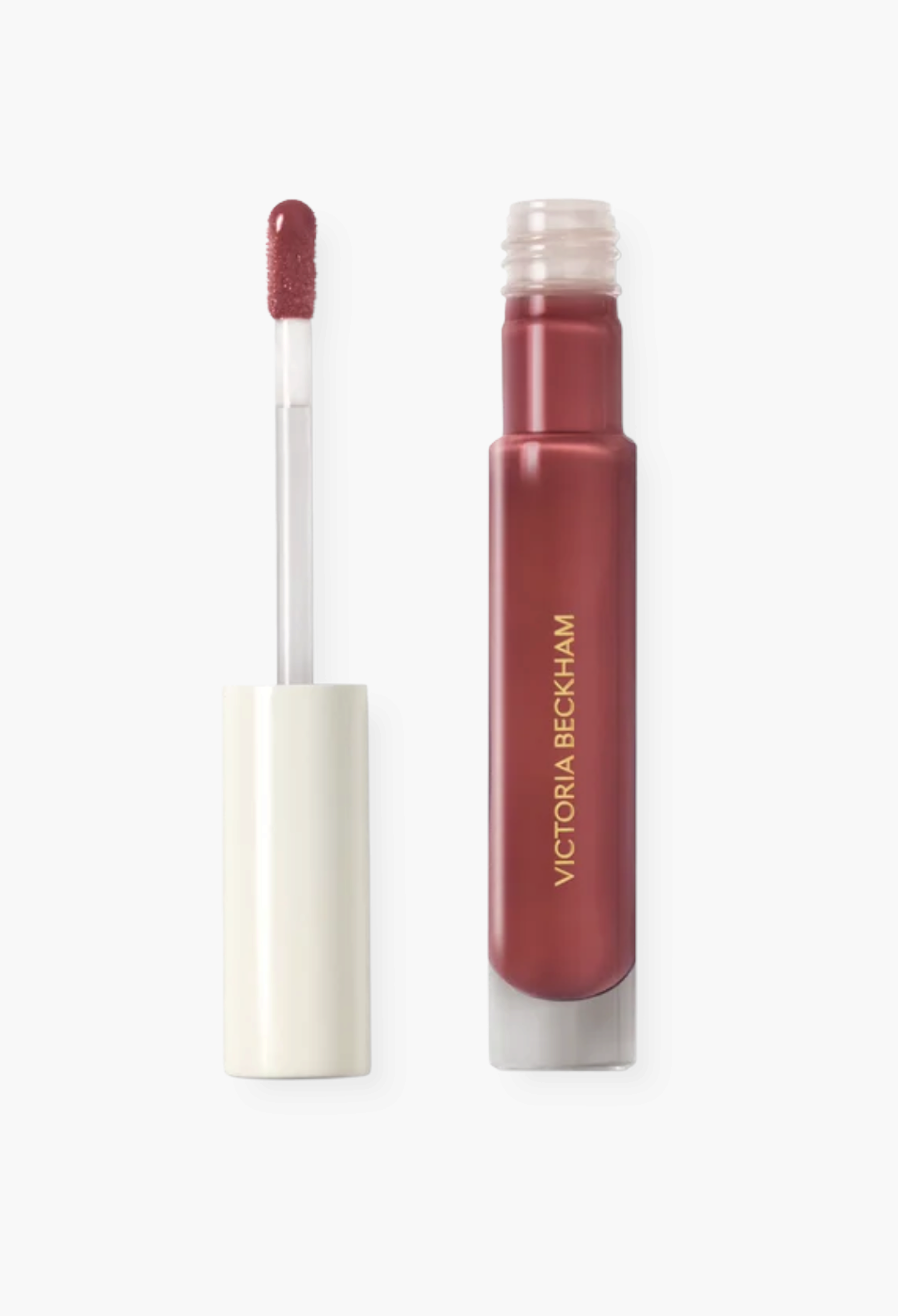 GLAM MODA Posh Gloss High Shine Lip in a deep mauve shade with a doe foot applicator and sleek glass tube packaging.