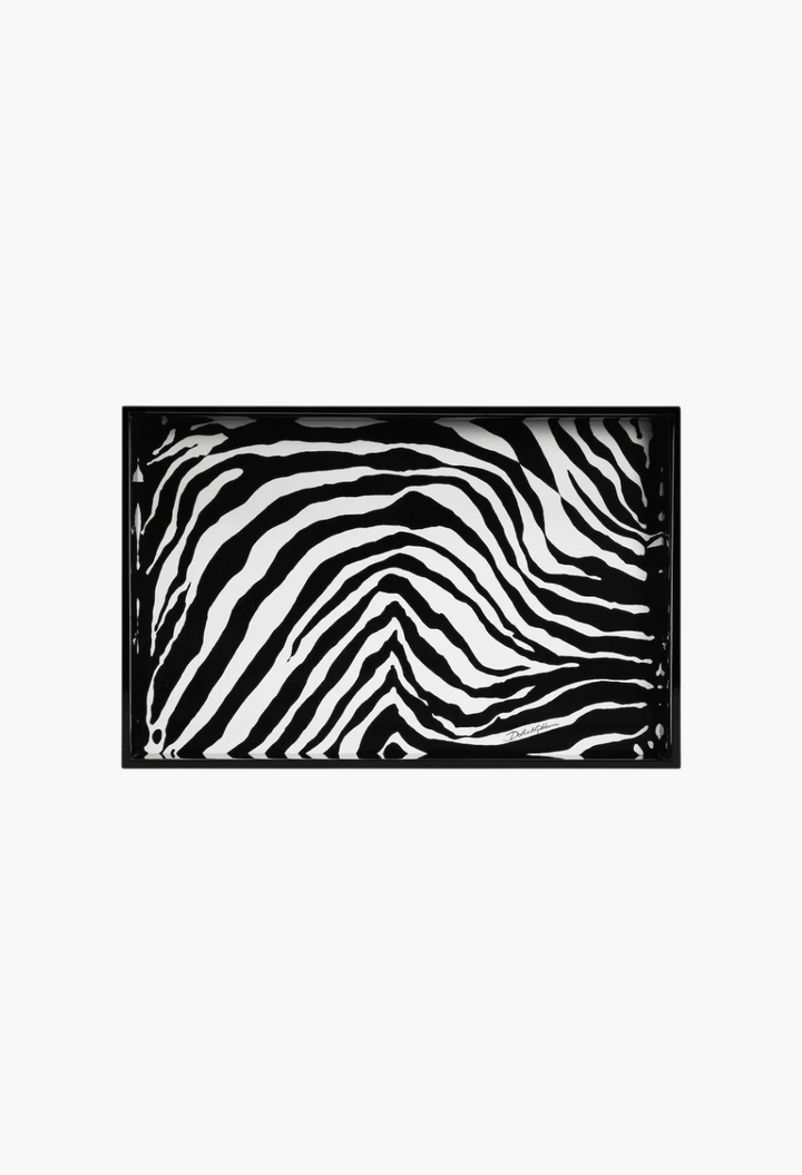 GLAM MODA Dolce&Gabbana wooden serving tray featuring a bold black and white zebra print pattern.