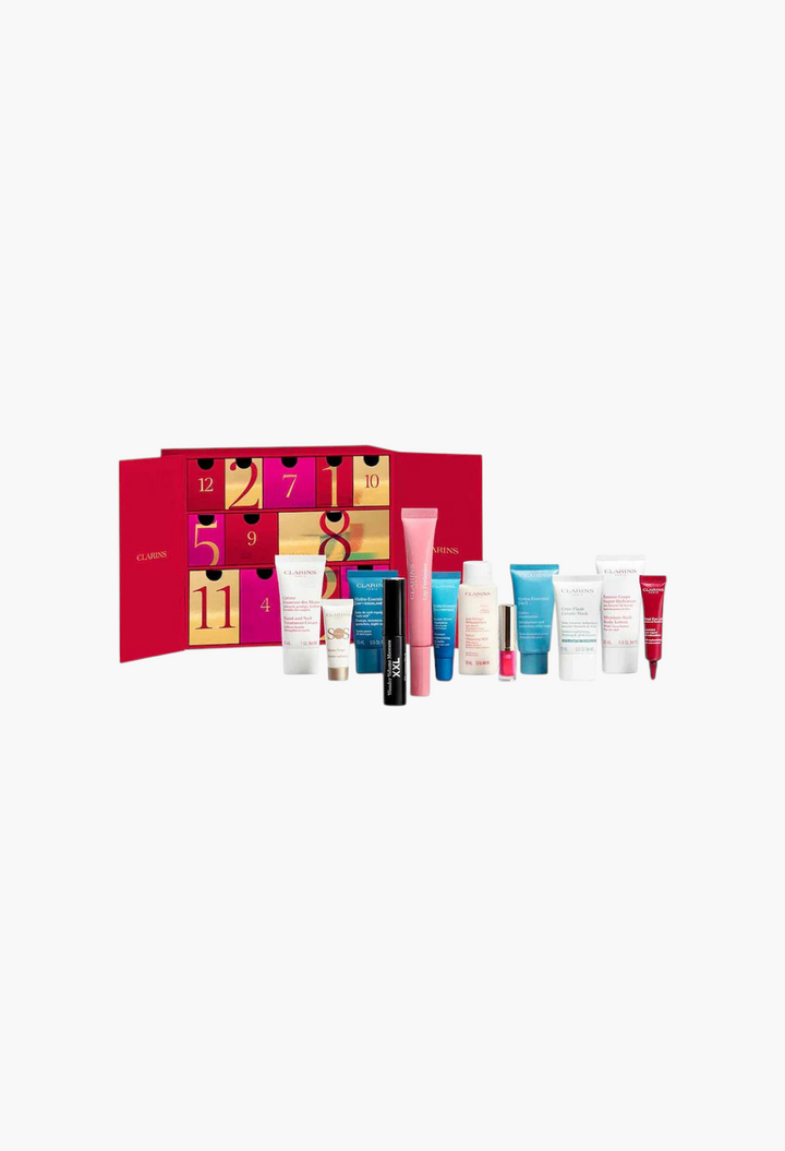 GLAM MODA 12-Day Beauty Advent Calendar featuring a red gift box with twelve Clarins skincare and makeup products.