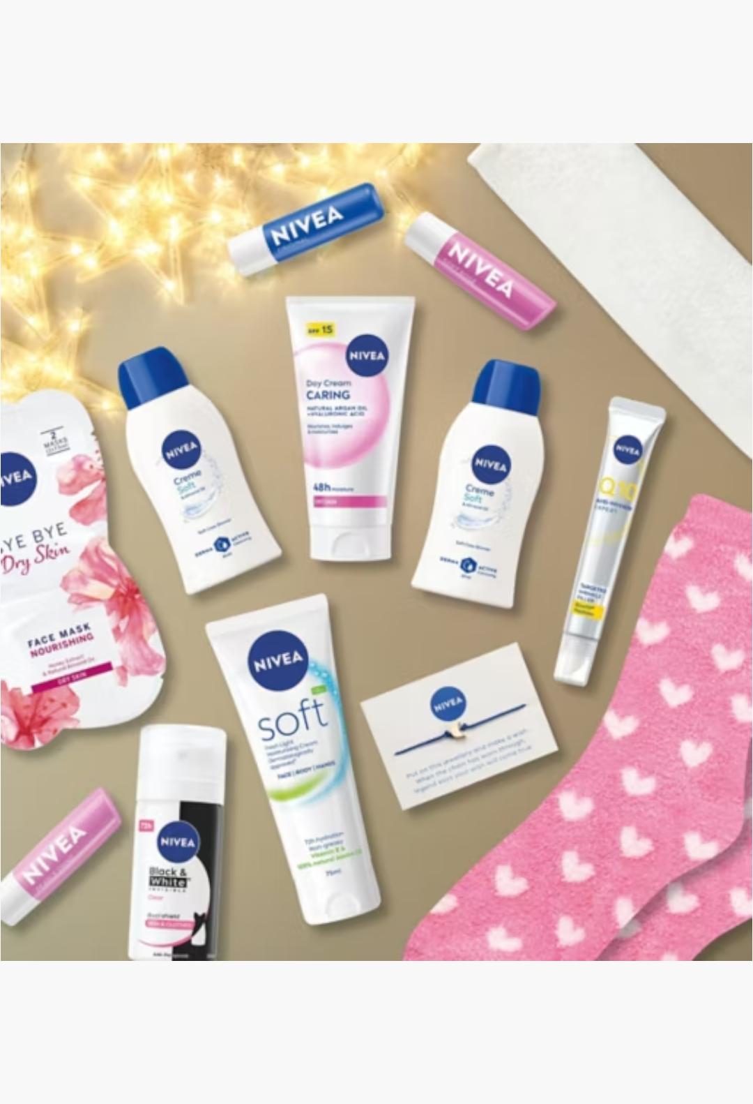 GLAM MODA NIVEA advent calendar featuring skincare products, lip balms, face masks, and pink heart-patterned socks.