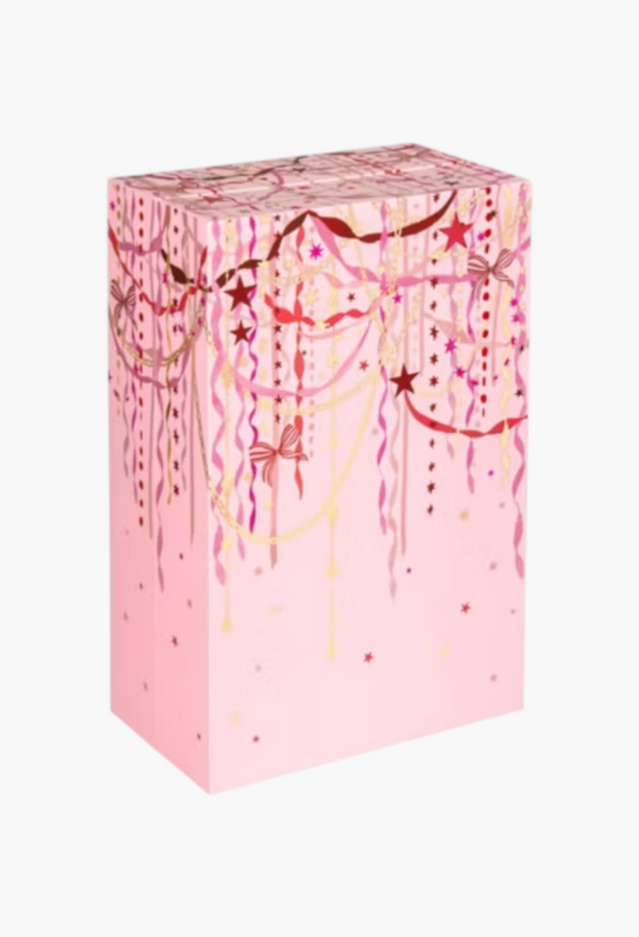 GLAM MODA 24 Days of Skin skincare advent calendar in a festive pink box with gold and red ribbon illustrations.