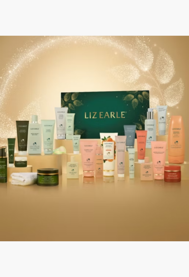 GLAM MODA Liz Earle 24-day beauty advent calendar featuring skincare and bodycare products on gold pedestals.