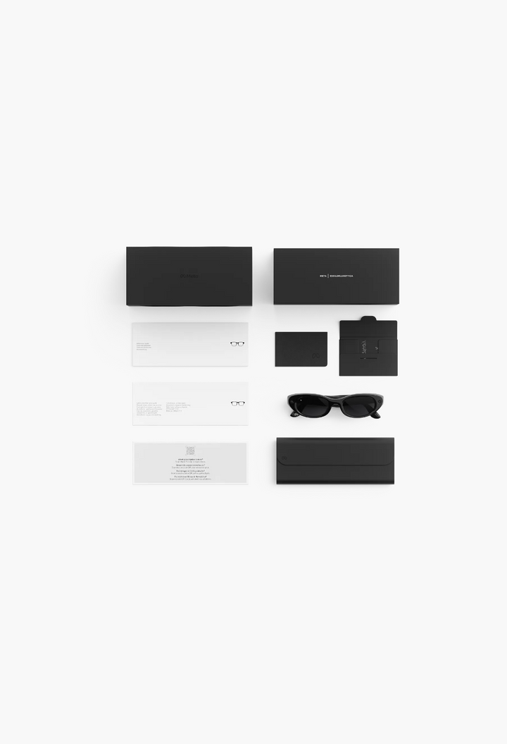 GLAM MODA Starfire Kylie Edition AI glasses with black oval frames, charging case, and included documentation.