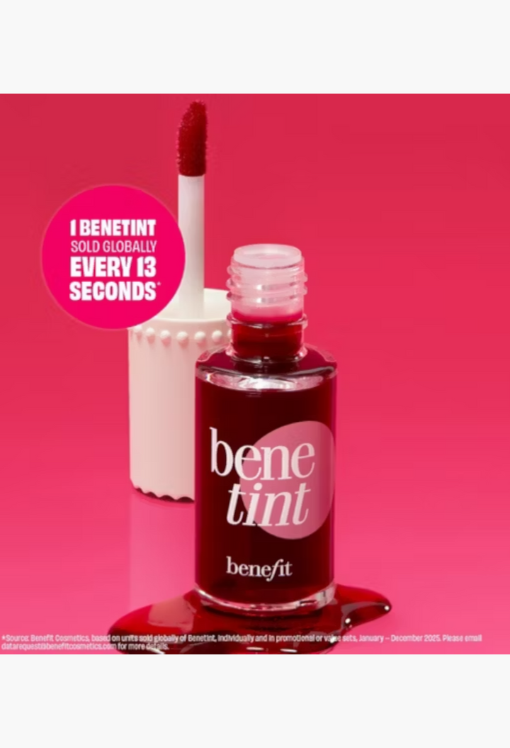 GLAM MODA Benefit Benetint rose-tinted lip and cheek stain bottle with applicator on a vibrant pink background