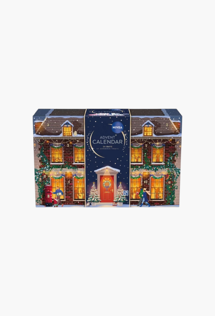 GLAM MODA NIVEA advent calendar featuring a festive house illustration with 24 numbered doors for Christmas surprises.