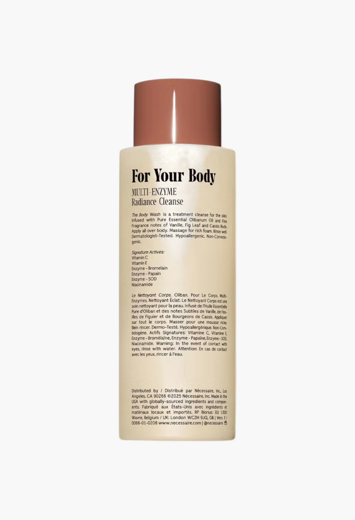 GLAM MODA Nécessaire The Body Wash Olibanum in a minimalist beige bottle with black typography on a white background.