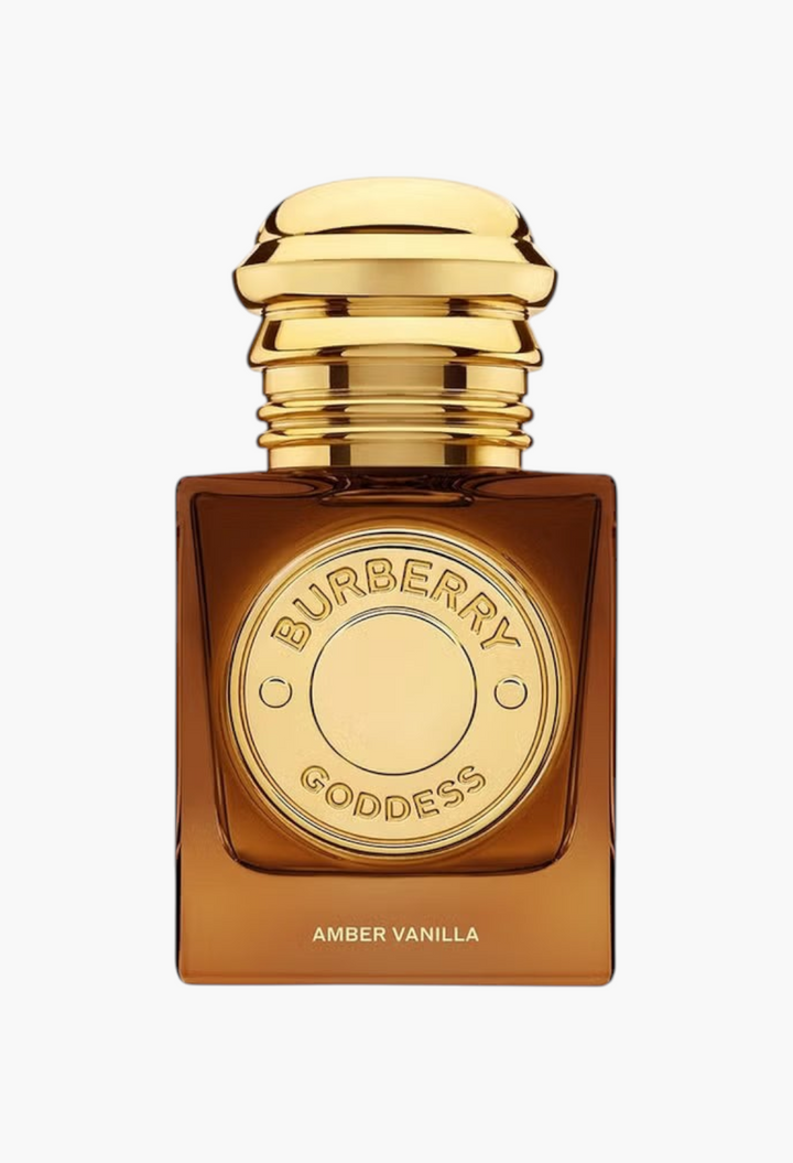 GLAM MODA Burberry Goddess Amber Vanilla perfume in a square amber glass bottle with a golden cap and medallion.