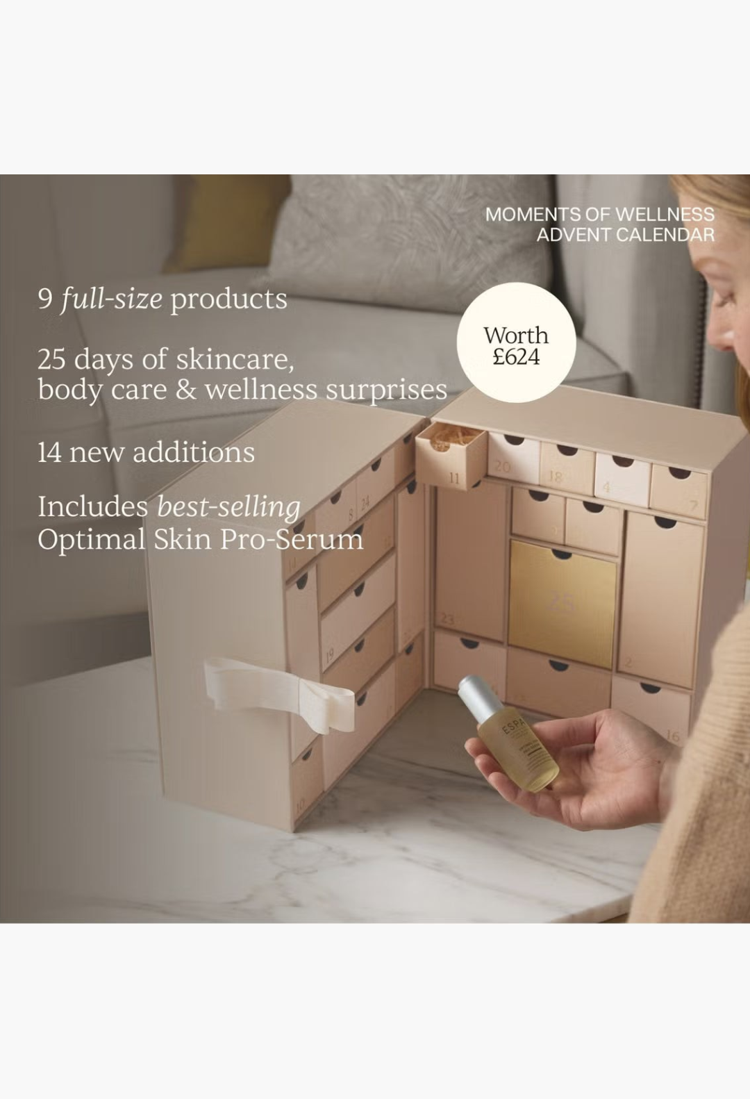 GLAM MODA ESPA Moments of Wellness Advent Calendar with skincare and body care products on a marble table.