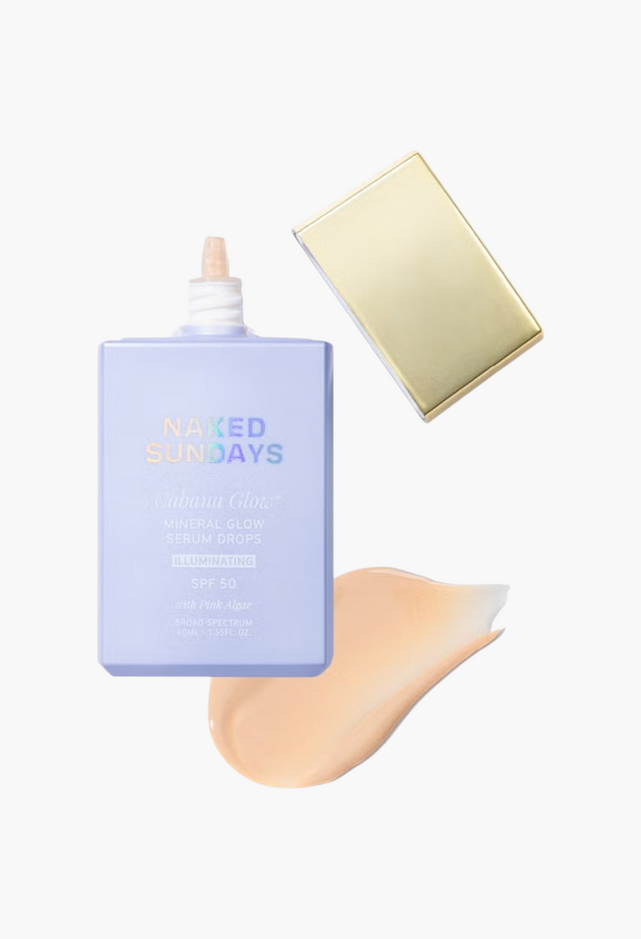 GLAM MODA Naked Sundays Cabana Glow SPF50 illuminating mineral serum drops in a light purple bottle with a gold cap.